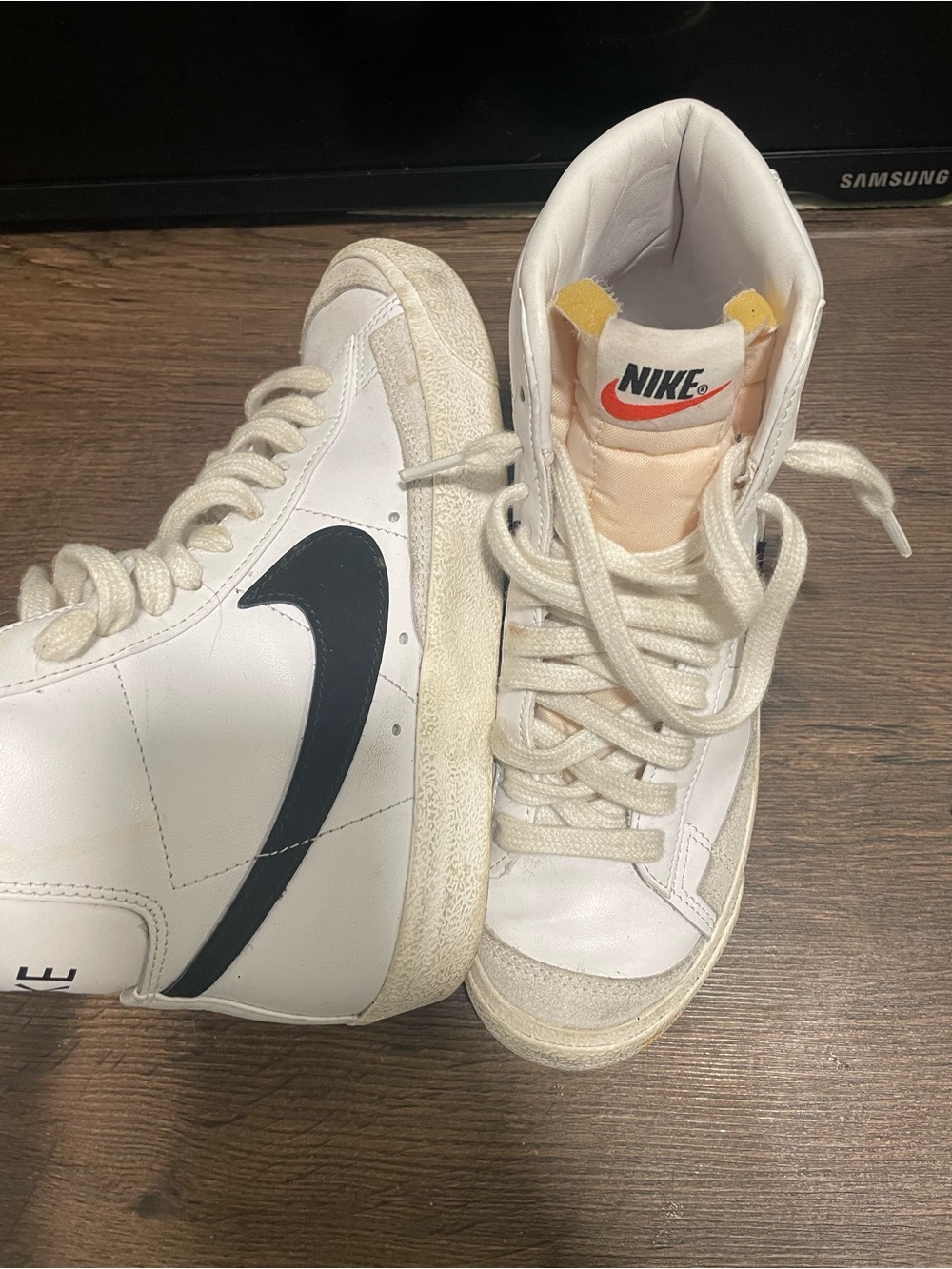Nike Women’s White High-Top Sneakers with Black Swoosh and Cream Accents
